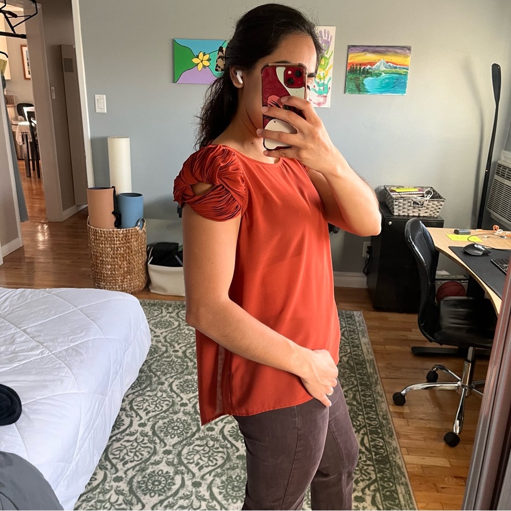 Sheer orange blouse